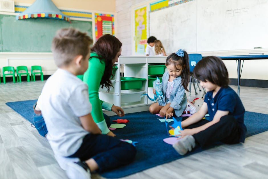 Kids and teacher in a kindergarten classroom.